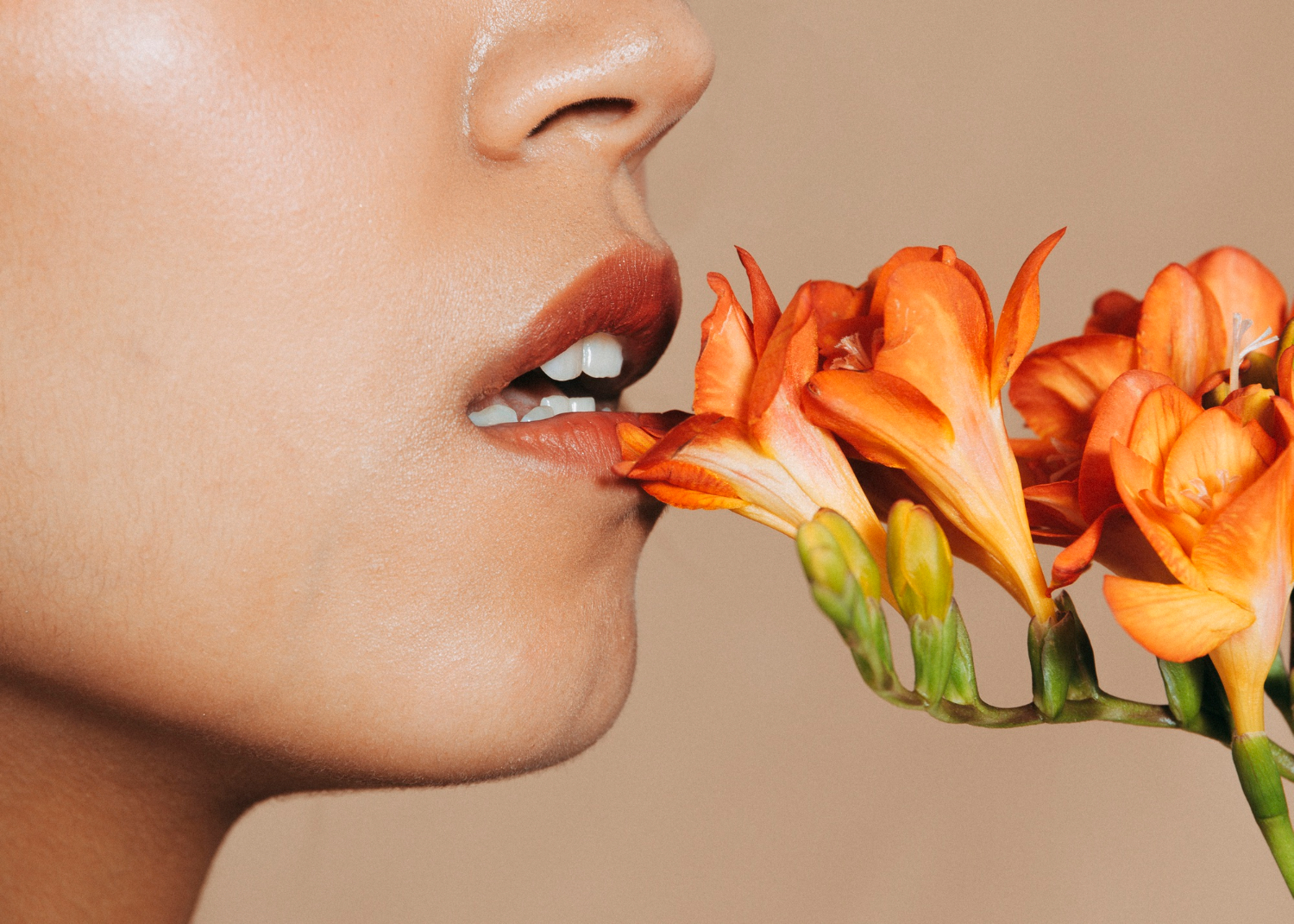 young-woman-s-lips-with-vivid-flower